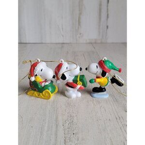 Vintage Snoopy sleigh Santa Claus skating gift ornament set Woodstock Xmas